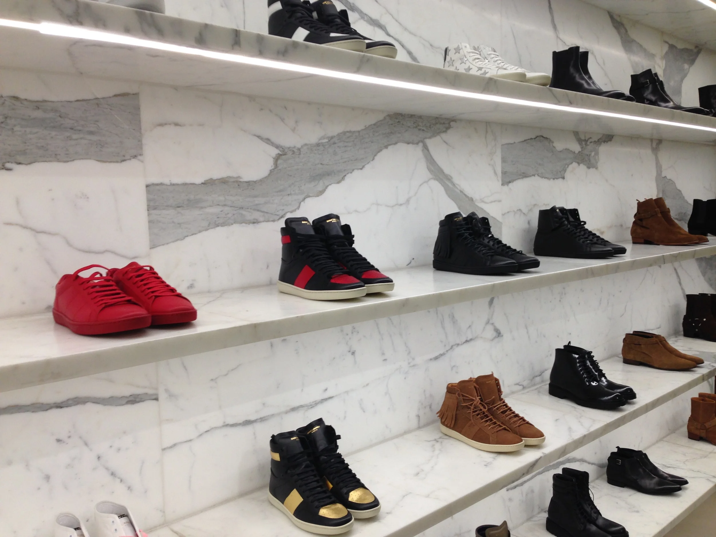 The sneaker display at a Saint Laurent Paris boutique, Dec 2015