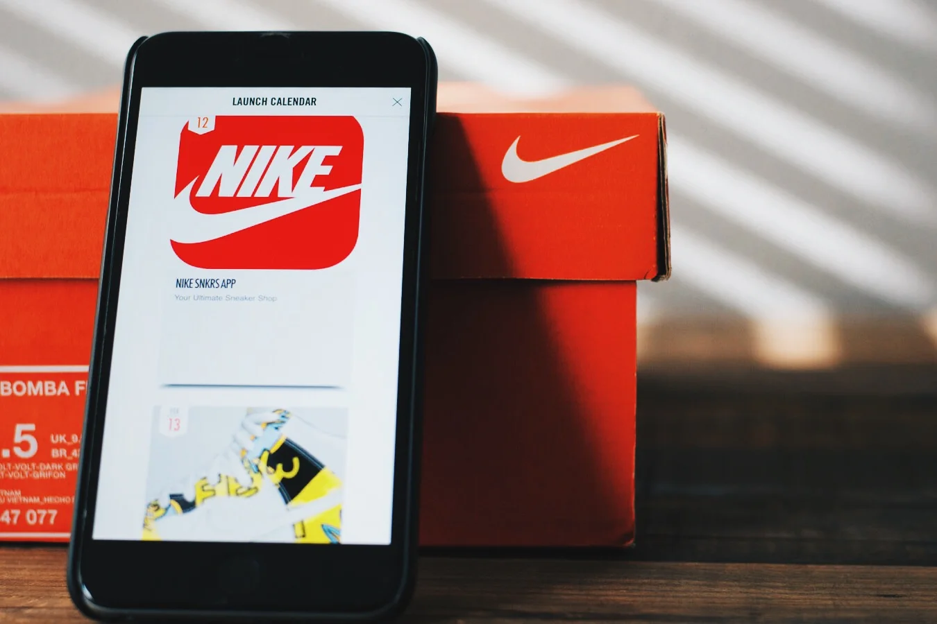 Graphic showing Nike's SNKRS app 