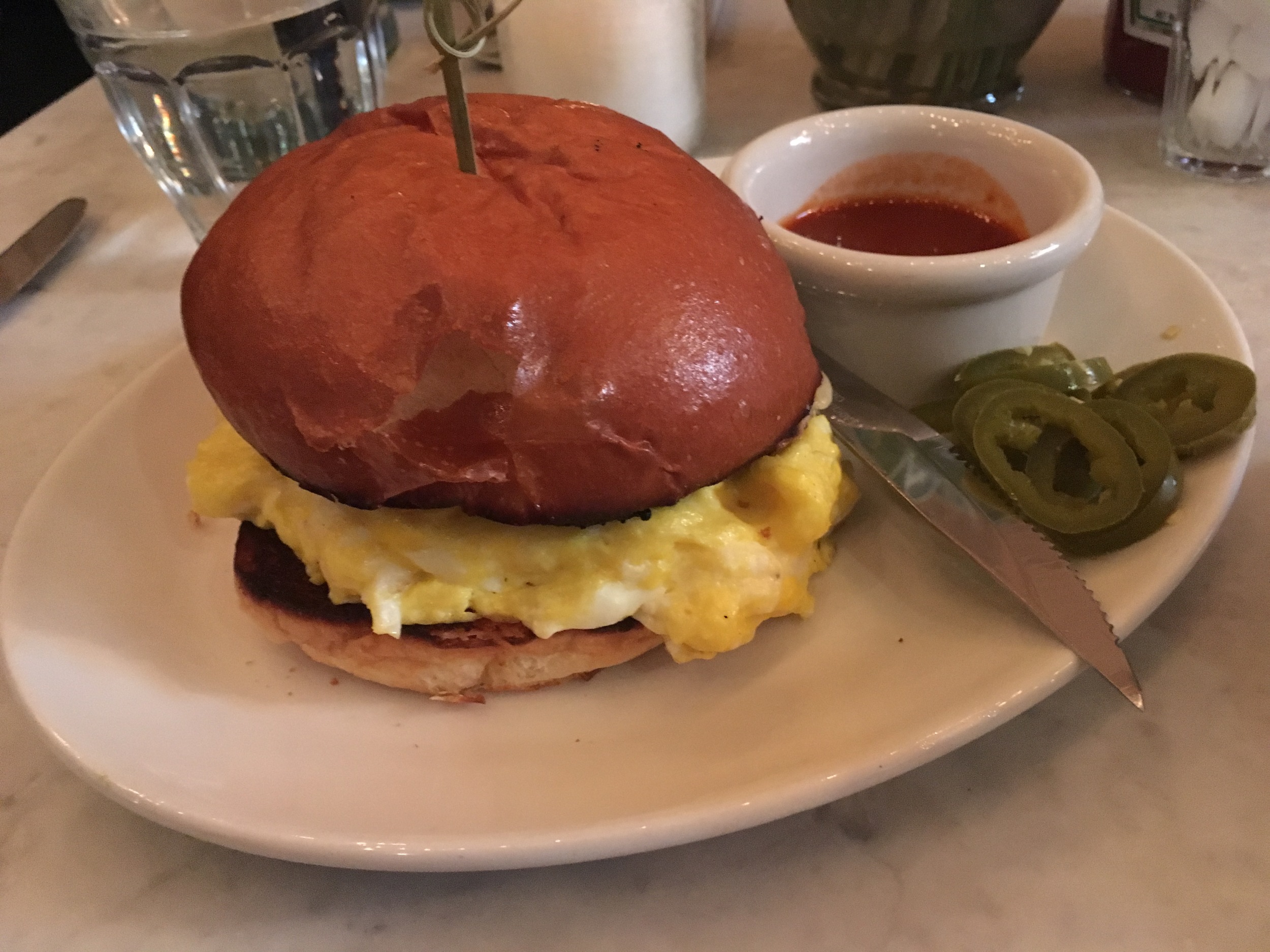 The Maple Sage Sausage Sandwich at The Wren (344 Bowery). Still no clue what that knife was for.