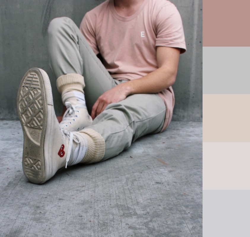 From unrelated colors to Hapsburg twins: low value, low saturation, relatively warm colors in descending intensity. The outfit itself is almost a gradient, from red all the way through beige and finally white shoes.