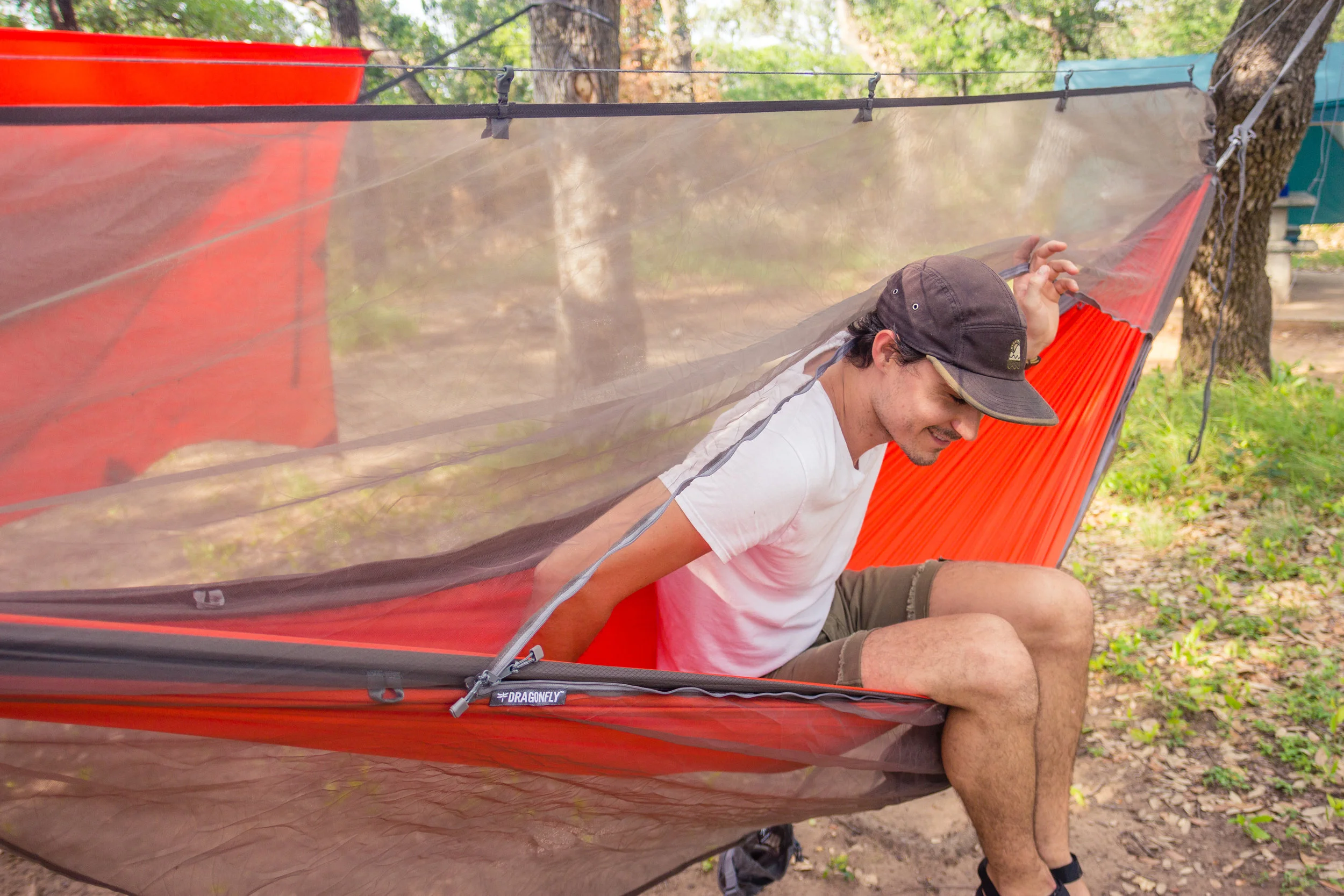 Chris trying the Dragonfly Insect Net over his Roo Hammock for the first time.