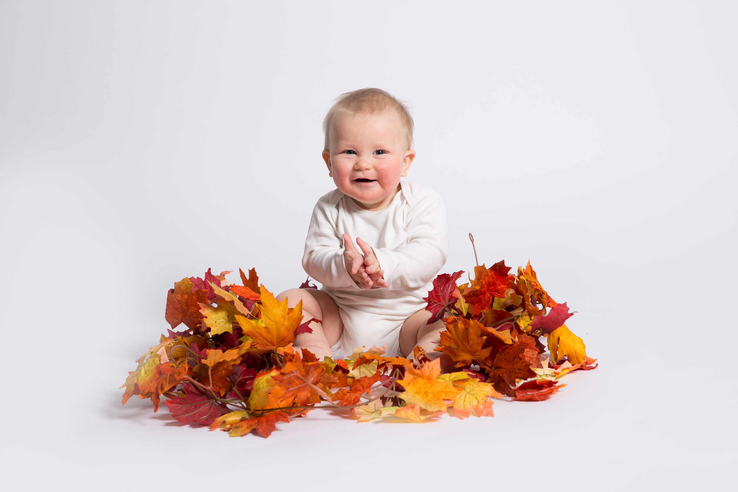 autumn-leaves-september-themed-baby-photo