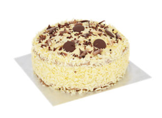 ASDA madeira cake with white chocolate frosting and chocolate decorations