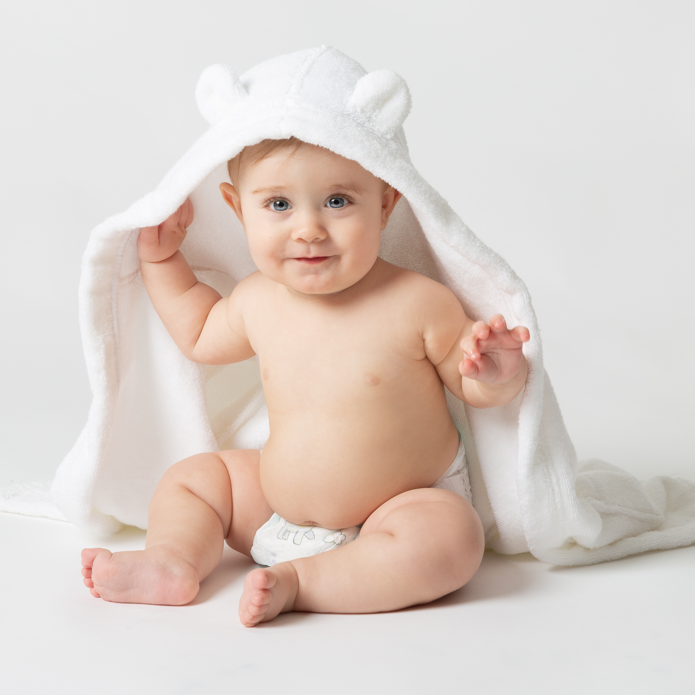 baby-hooded-towel-sitting-nappy-east-london.jpg