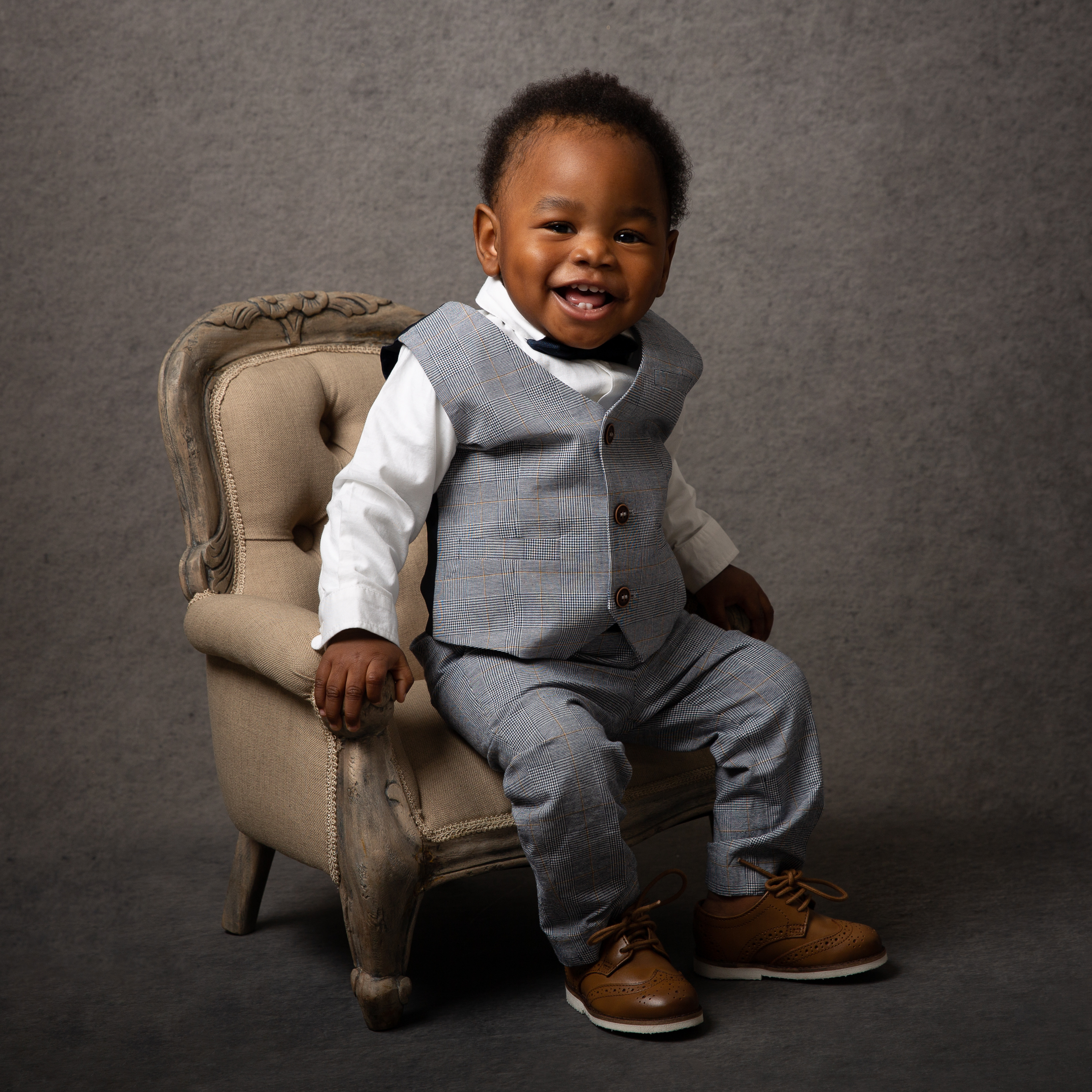 baby-boy-studio-photo-sitting-armchair-east-london-photographer.jpg