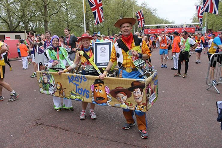 London Marathon. Record for “fastest marathon in a three-person costume” time: 4:56:24. Photo: Guinness World Records. Found on Runner’s World .