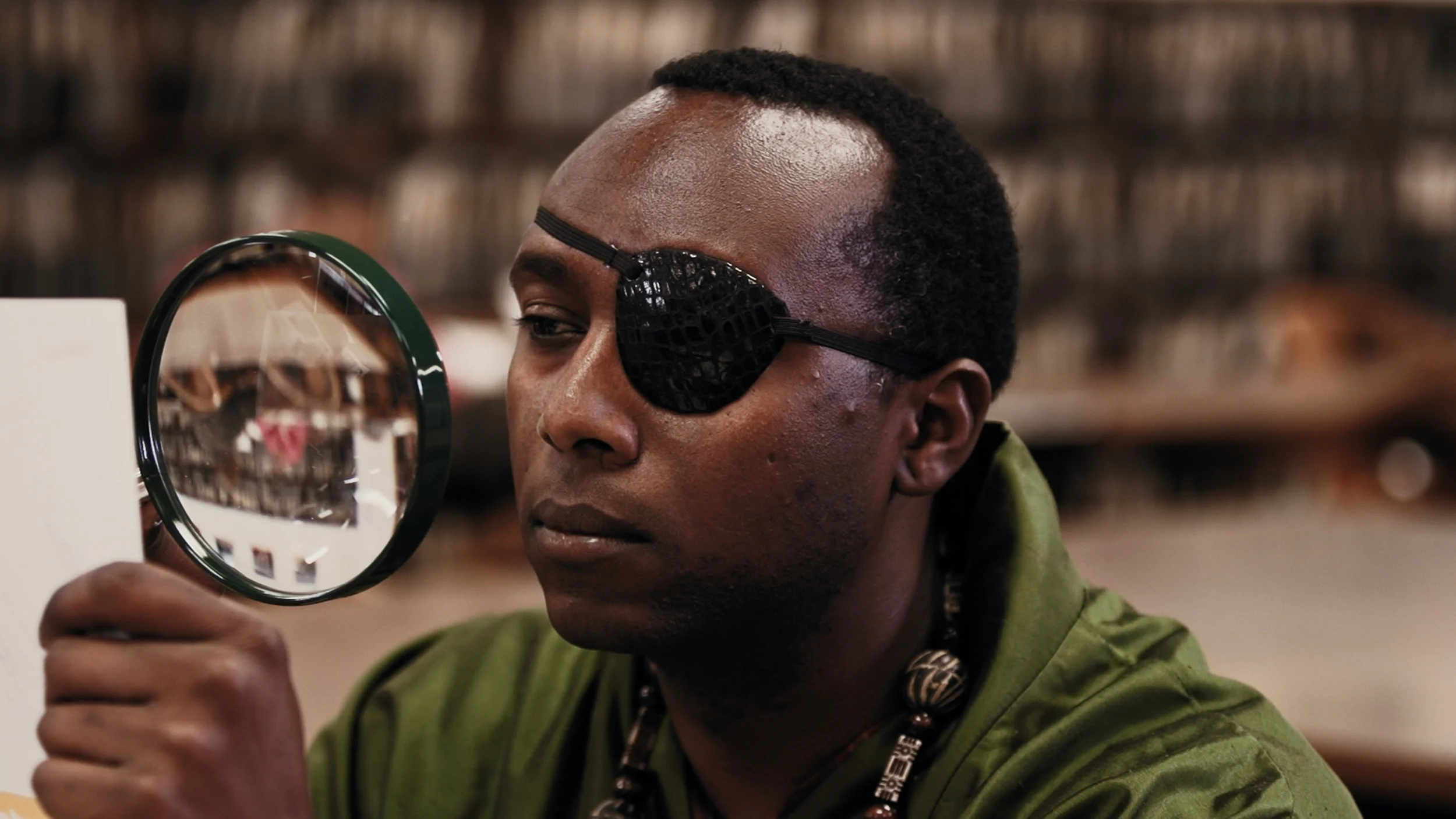 Patron with Magnifying Glass copy.jpg