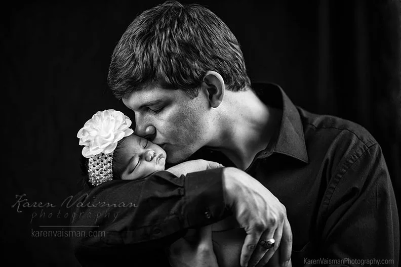 Intimate moments with Father and infant