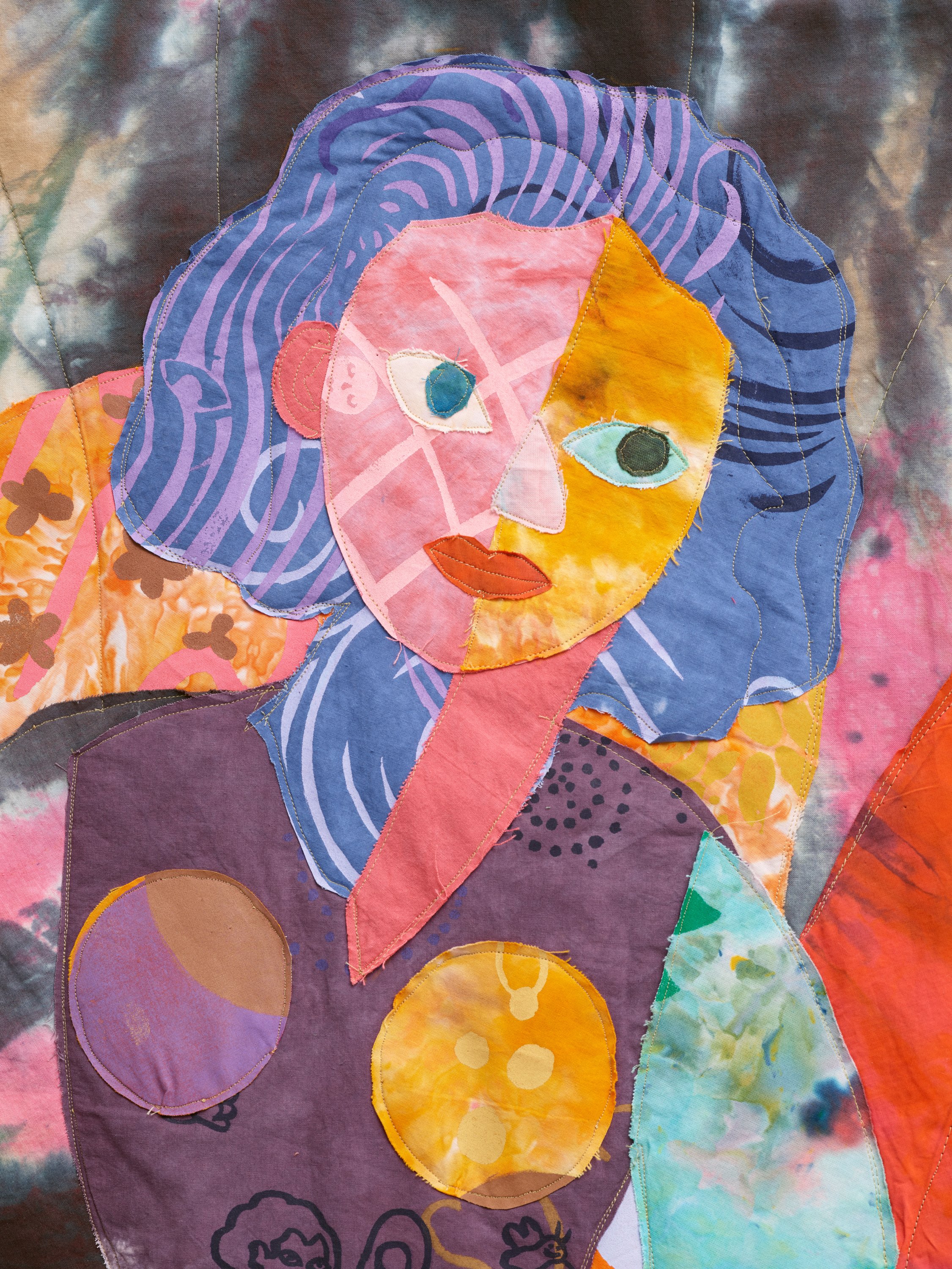   Y Comencé , 2025. Hand dyed and screen printed fabric, thread and batting.&nbsp;54 x 56 in ( 137.2 x 142.2 cm) 