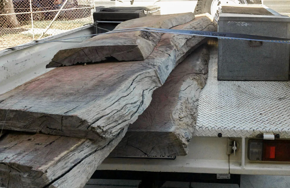 Red Gum slabs, a tree native to Australia, ready to be polished into tap room bar tops.