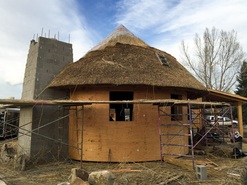 Thatching the 'Witches Hat' at our Animal House project