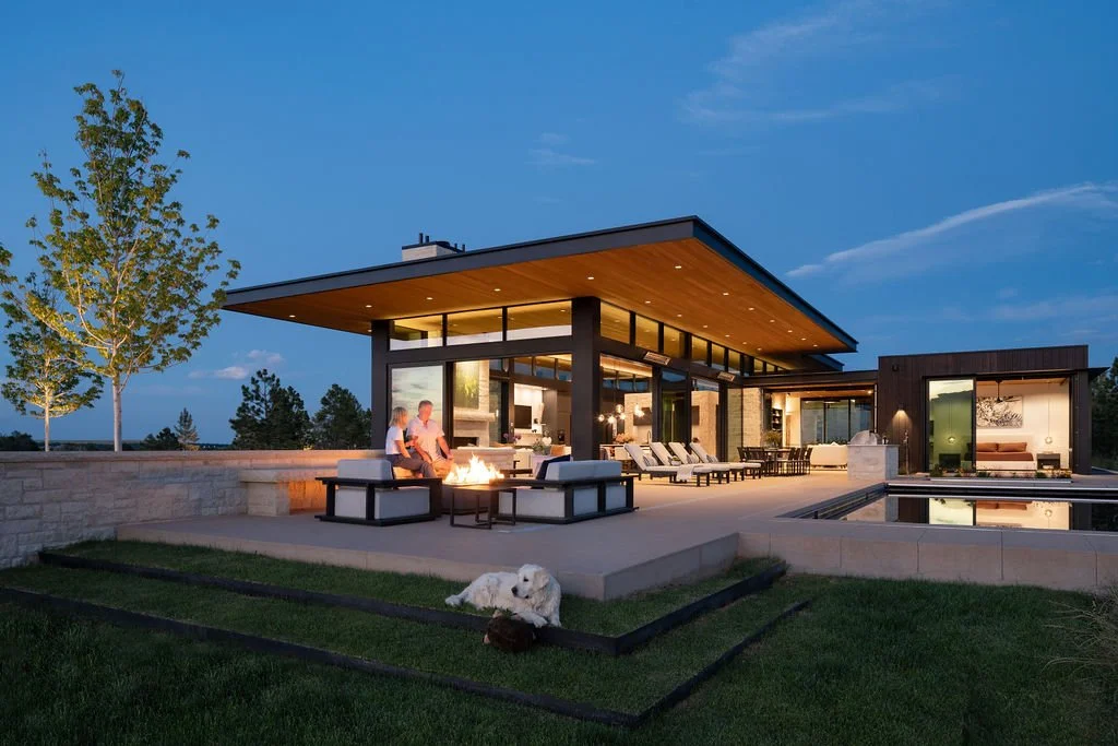 MaggiesFarm_SurroundArch-Exterior-NorthWest-Elevation-Pool-Twilight-2.-with-People.jpg