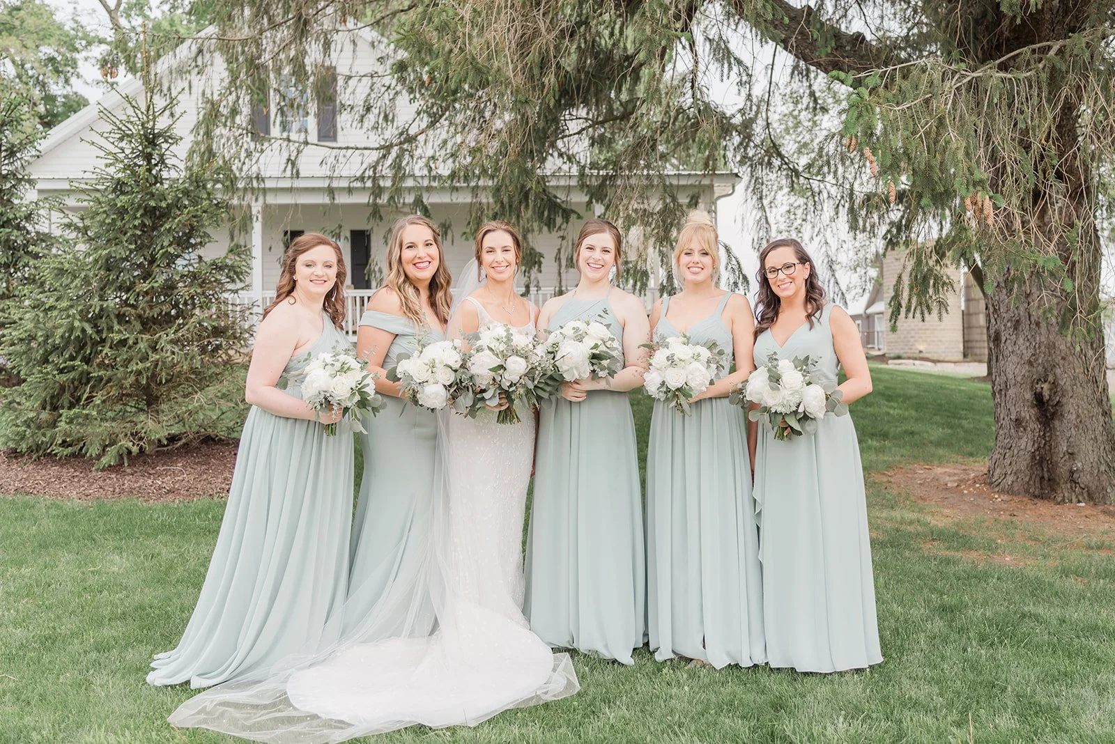 Lauren and Mike's wedding at Lilac Acres - bride and bridesmaids