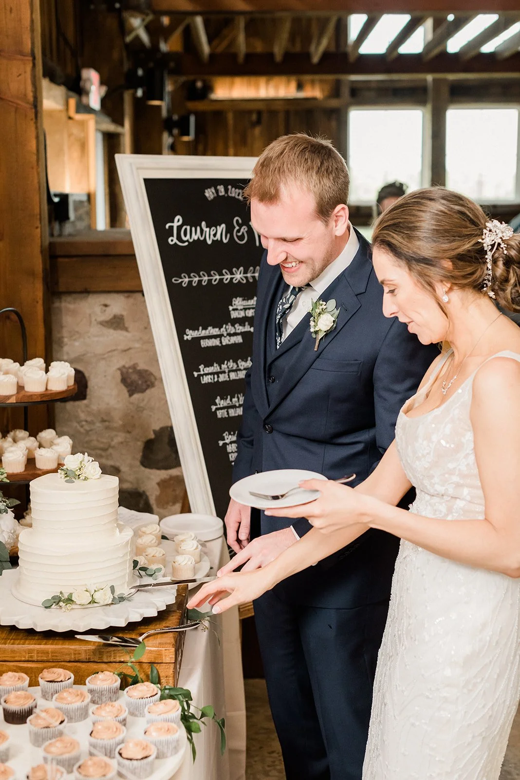 Bride and groom cutting the cake