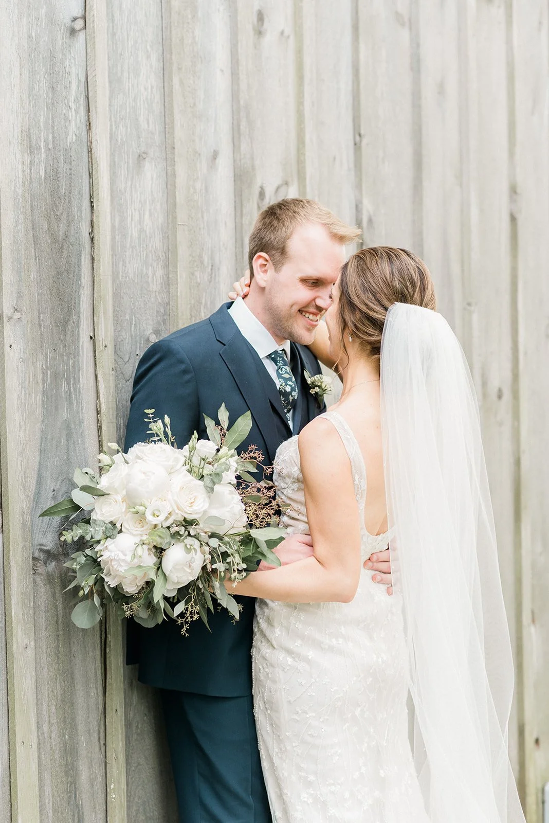 Bride and groom smiling