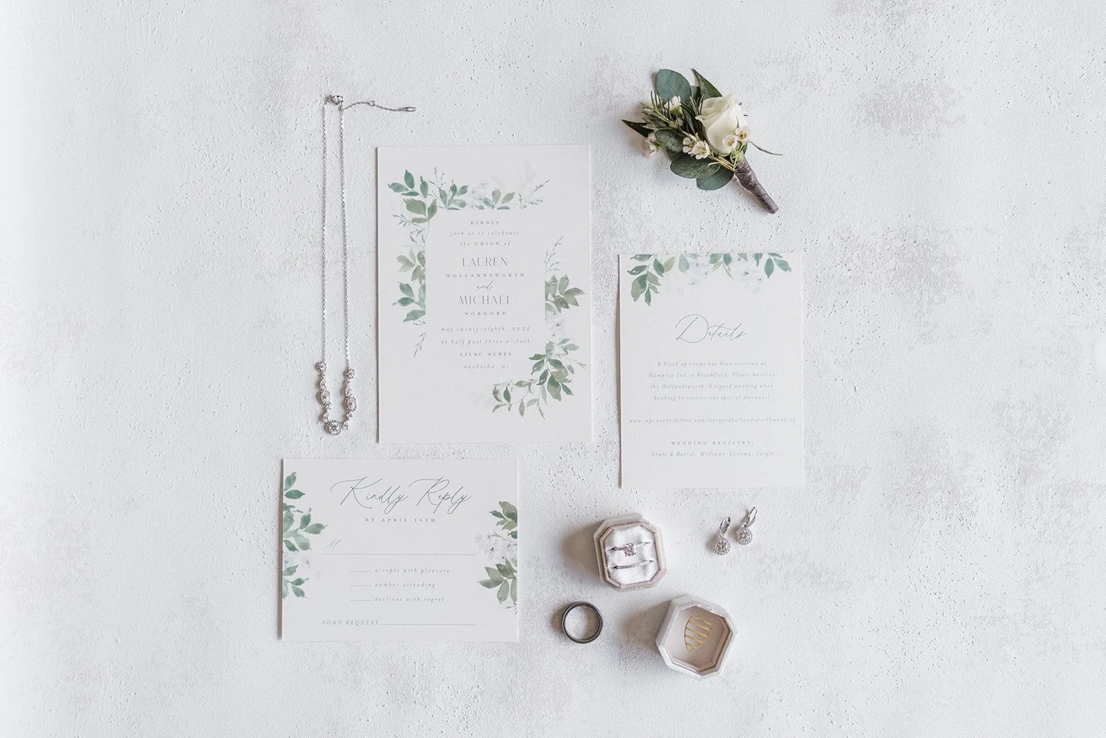 Wedding stationery with jewelry and flowers