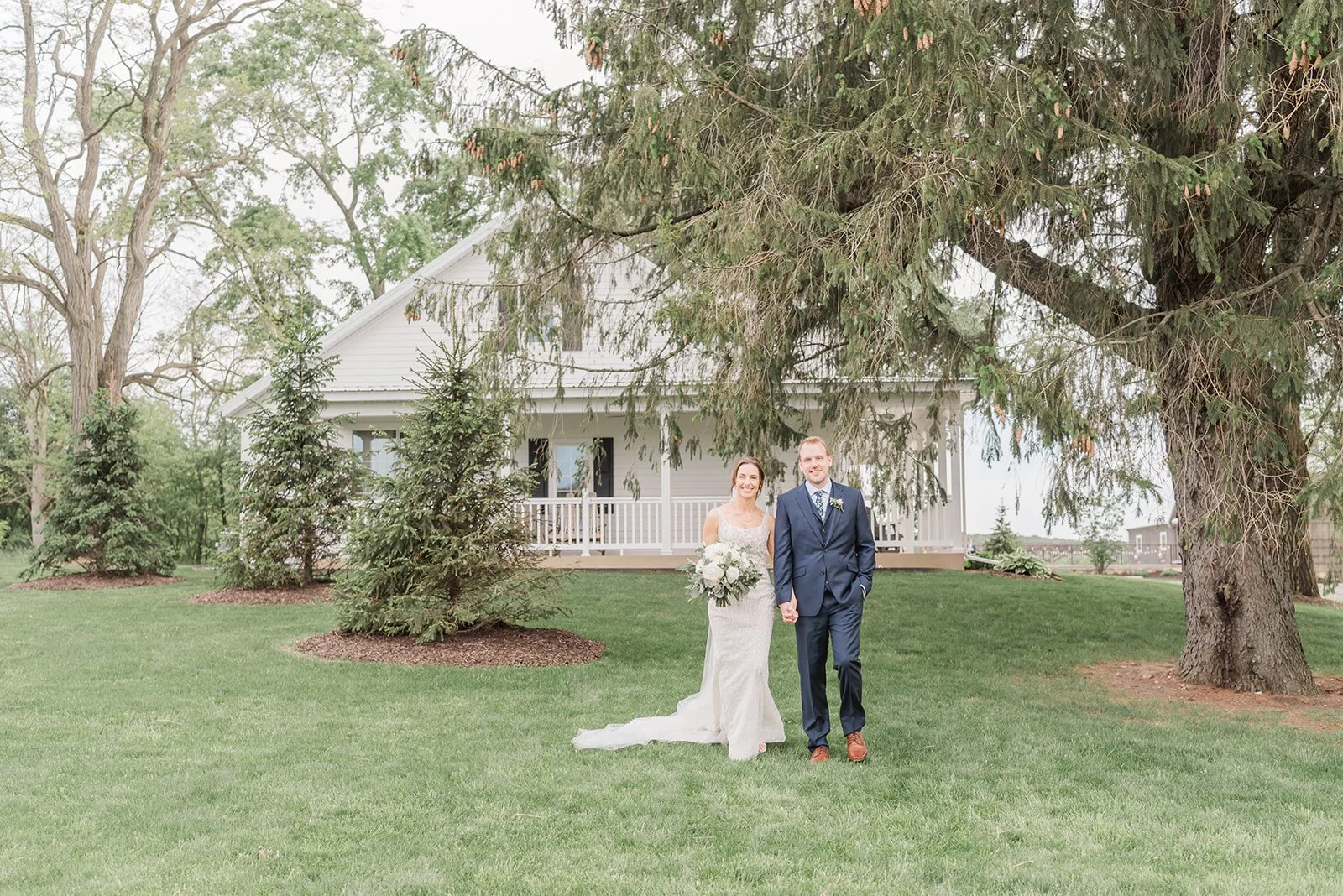 Bride and groom walking toward camera
