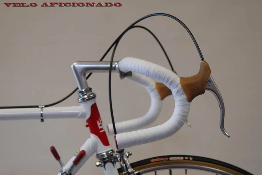 Cloth wrapped handlebar tape. 