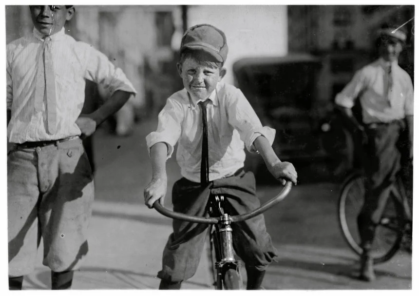 Eleven year old Western Union messenger #51. J.T. Marshall Houston,Texas. “Been day boy here for five months. Goes to Red Light district some and knows some of the girls.” October 1913