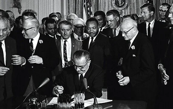 President Johnson signs the Voting Rights Act of 1965