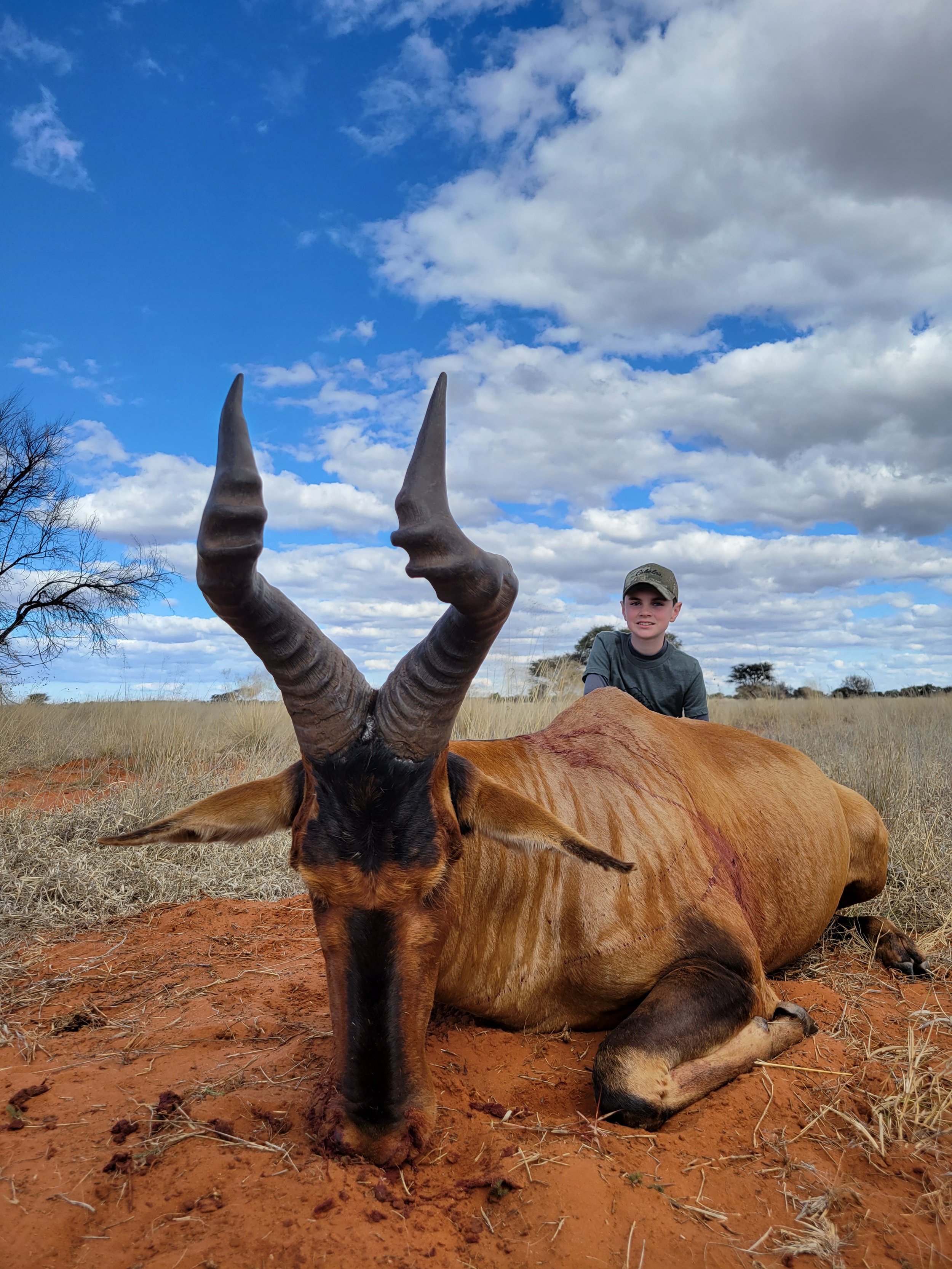 Ivan with his red hartebeest.jpg