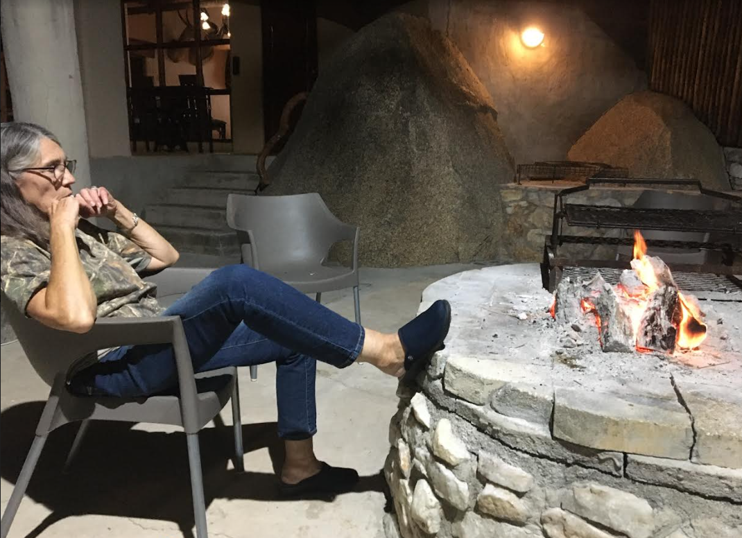relaxing at the fire.PNG