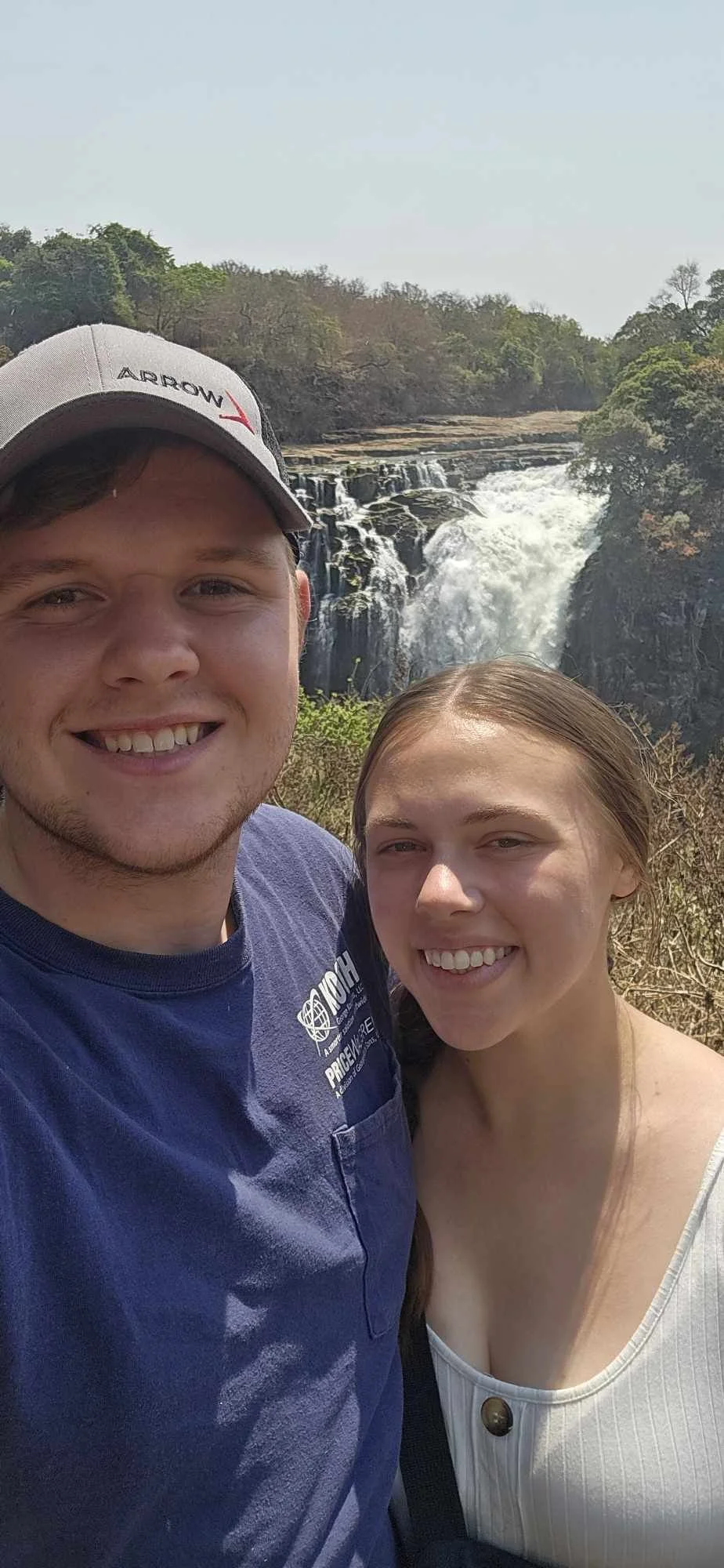 The engaged couple (Evan and Grace) in front of Victoria Falls.jpeg