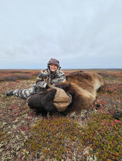 Mary with musk ox.PNG