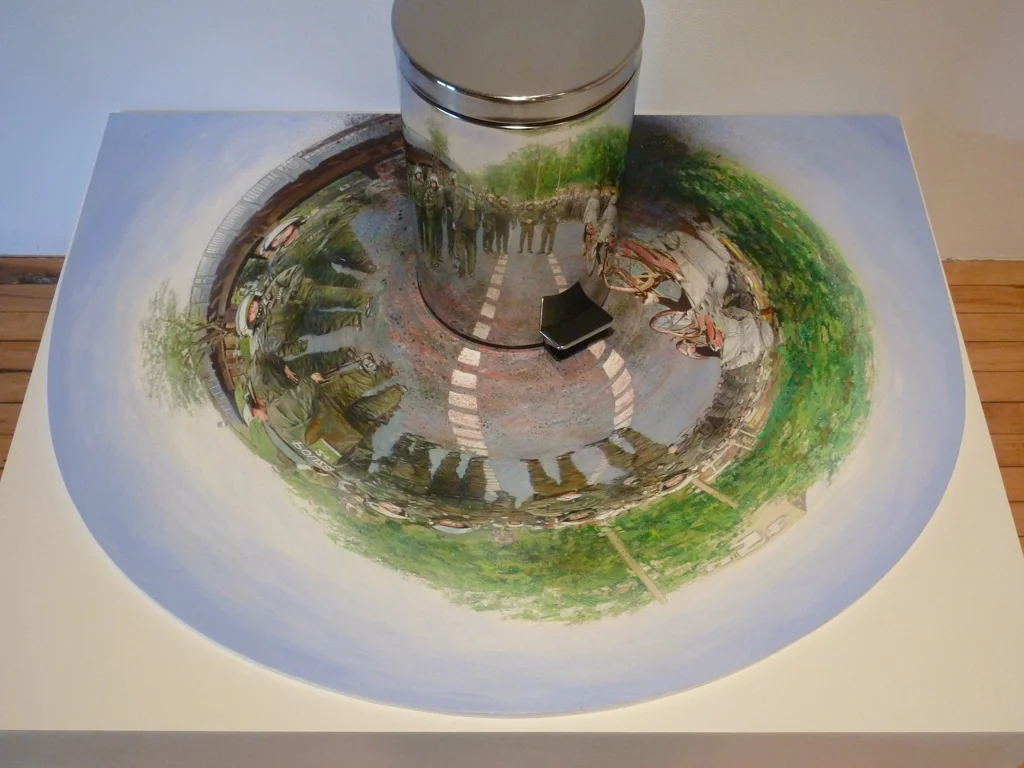 Along Skalitzer Anamorph, acrylic on wood, approx. 115 x 88 x 71 cm with metal garbage bin, 2011.