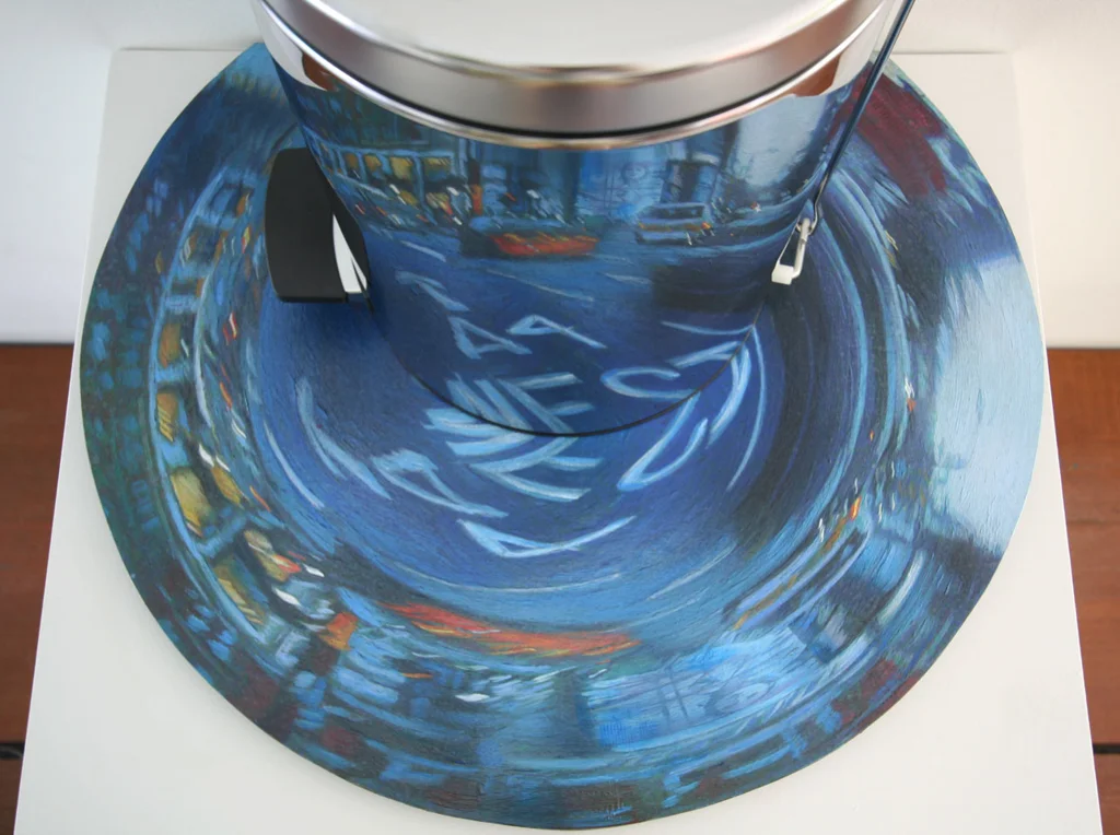 Knightsbridge Anamorph, acrylic on wood with metal garbage bin, 2009.