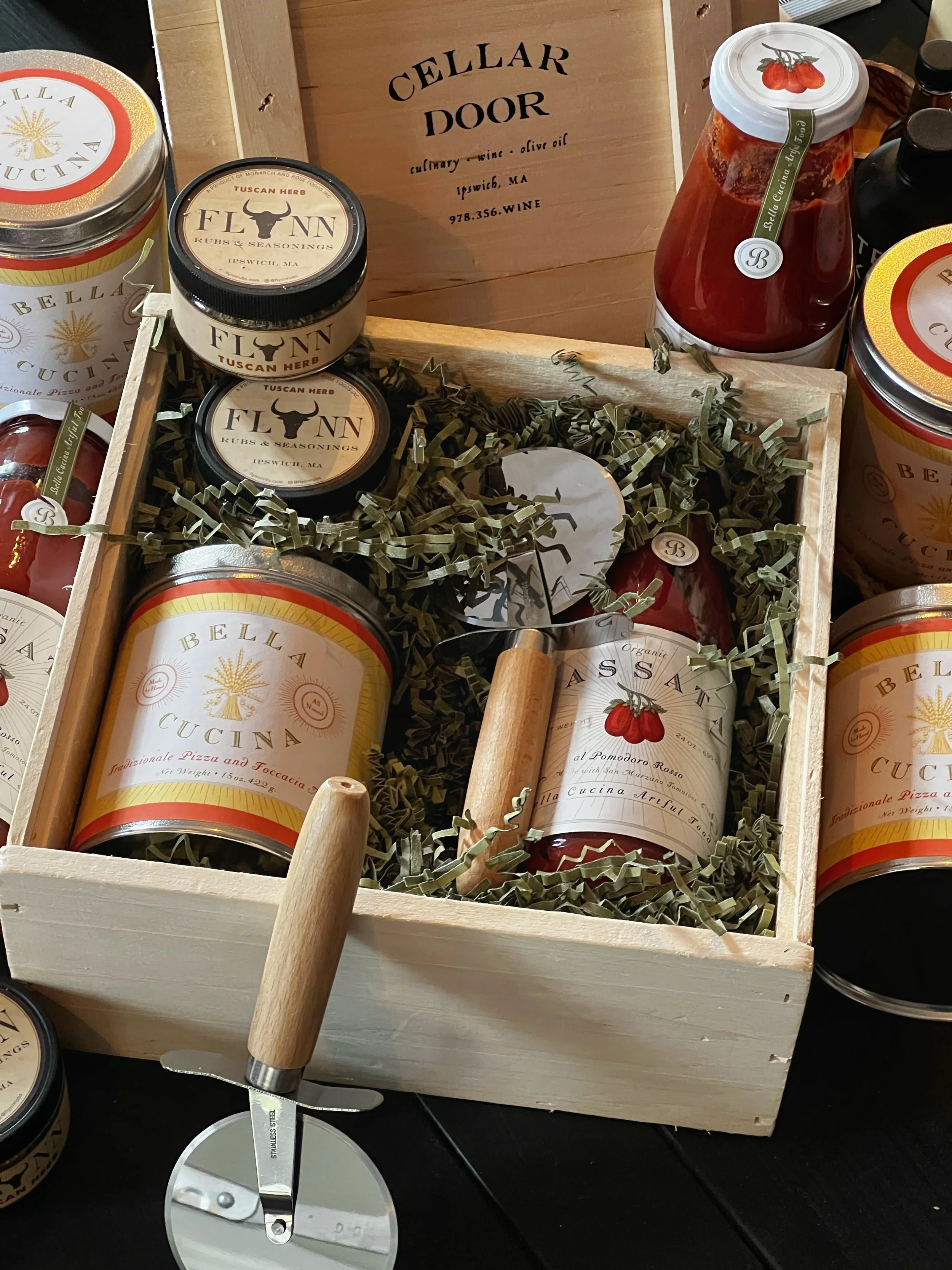Pizza Night - Bella Cucina Pizza and Foccacia Mix, wood and stainless pizza wheel, San Marzano tomato sauce, Flynn's Tuscan Herb Blend, all nestled in a custom wooden gift crate