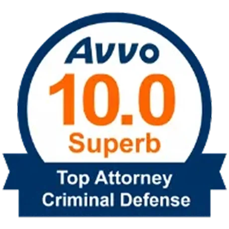 Badge with 'AVVO 10.0 Superb' and 'Top Attorney Criminal Defense' written on it.