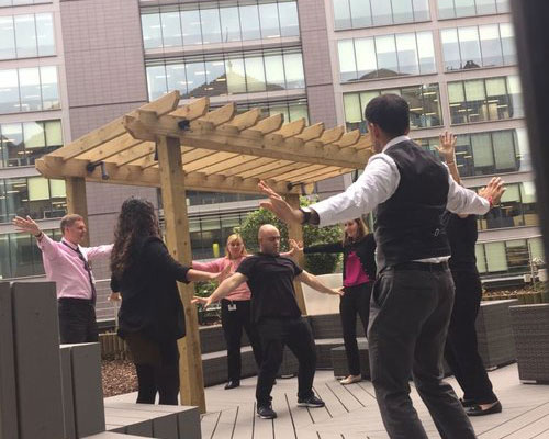 Group qigong for wellbeing class in the workplace.jpg