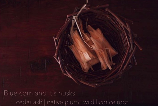 Blue corn and its husks | cedar ash | native plum (Johnny speaking) Here is a dish that is inspired by my childhood growing up at the pueblo. I would go to my friend’s home and his mom would always make us blue corn atole with cedar ash and honey- sometimes bear fat is include. The wild plums from the surrounding area are picked and dried for use in the winter. In this case we cooked these dried plums with honey and a piece of native licorice root, wrapped inside of blue corn masa ground by us on a stone grinder from Acoma pueblo, with cedar ash, steamed inside of it's corns husks.