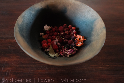 Wild berries | flowers | white corn meal (Johnny speaking) This dish is a great example of the fleeting nature of time. 7 or so wild berries, mountain strawberries, mountain raspberries, bear berries, chokecherries, wax currant, wild plum, gooseberry. With flowers from the land we live on and a sauce made of white corn and three leaf sumac berry. (Due to the brief peak season of these ingredients) we were only able to serve this dish to two or three dinners.