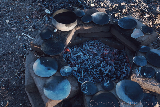 Carrying on traditions (Johnny speaking) There is this magic of doing things the way your ancestors did them. A way of connecting to these people and times that are slipping from our lives. All of the vessels are fired in a pit, with cedar from the woods near by, done in the old ways.