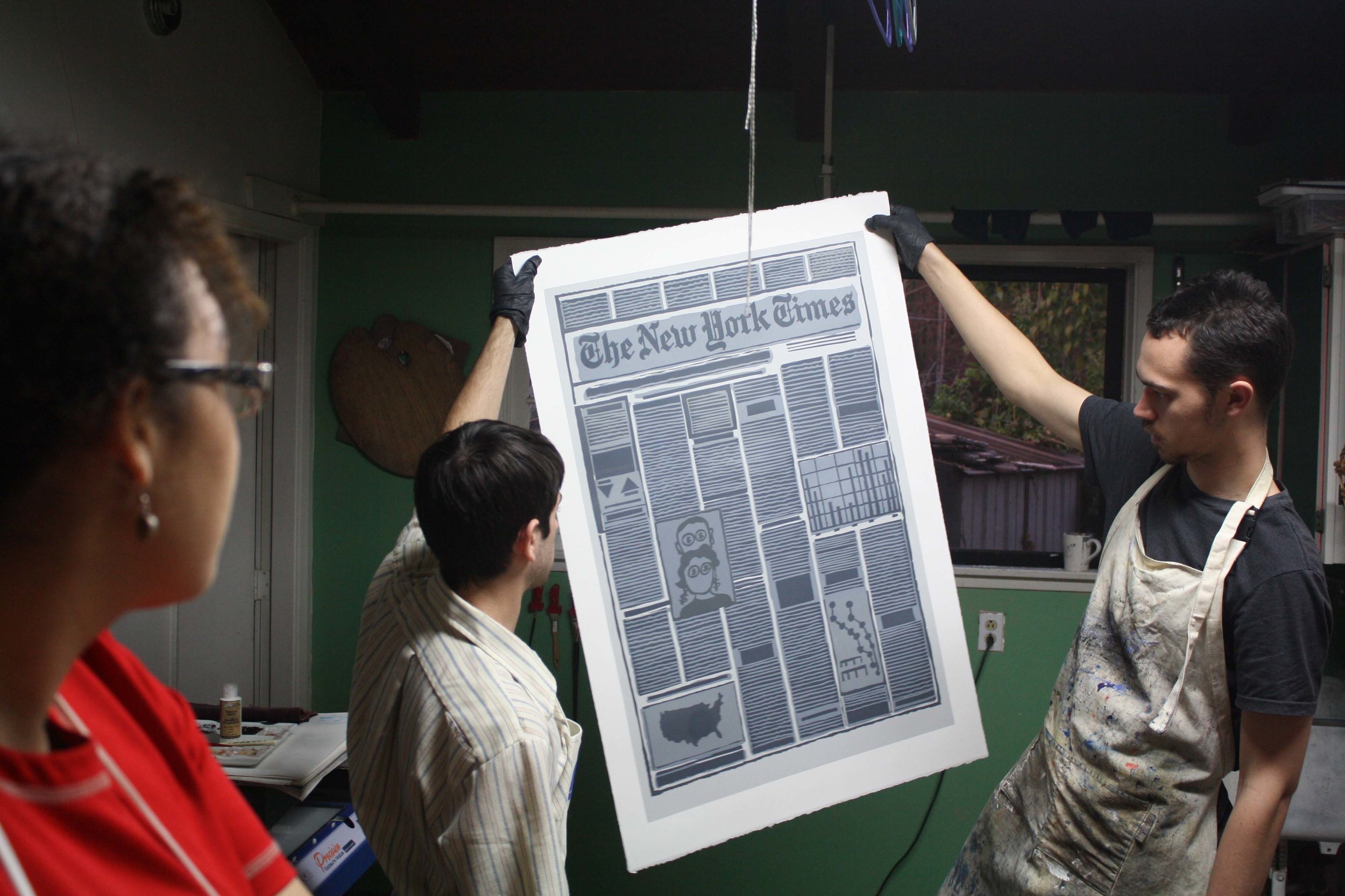 Miles Lewis and Yehuda Blum Hold Up A Screenprint Done For Derek Boshier - Winter 2013
