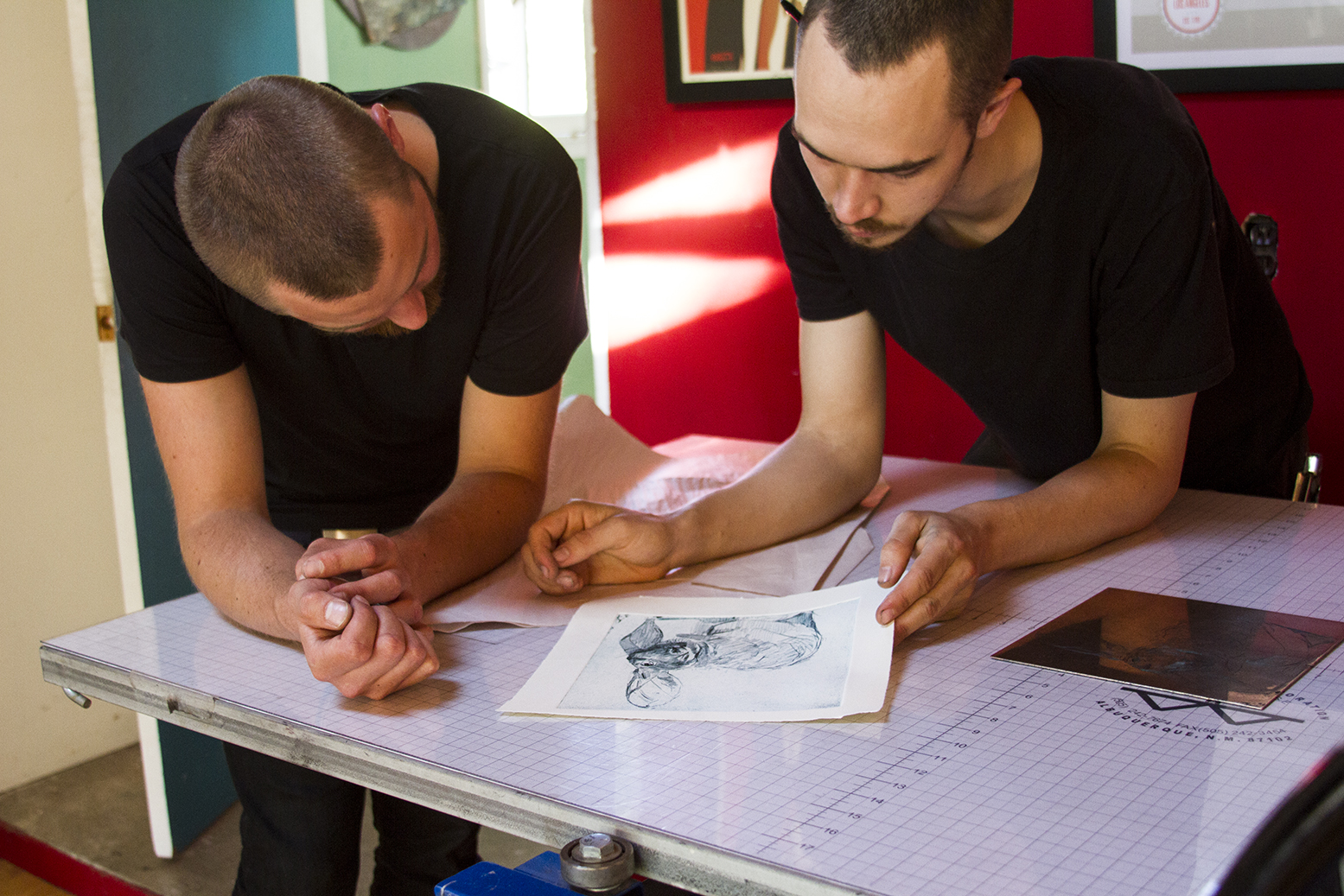 Artist-in-Residence Benjamin Bjorklund Reviews Etching Proof with Miles Lewis 