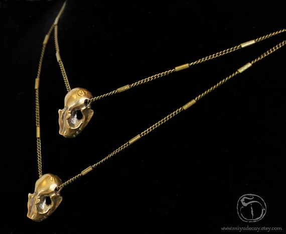 Brass Bat Skull Charm Necklace - SOLD - Necklace length is 16.” Skull measures about 18mm from back of head to front of skull.