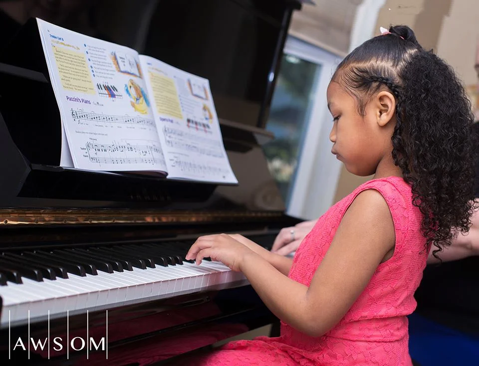 Isabella Playing Piano.jpg