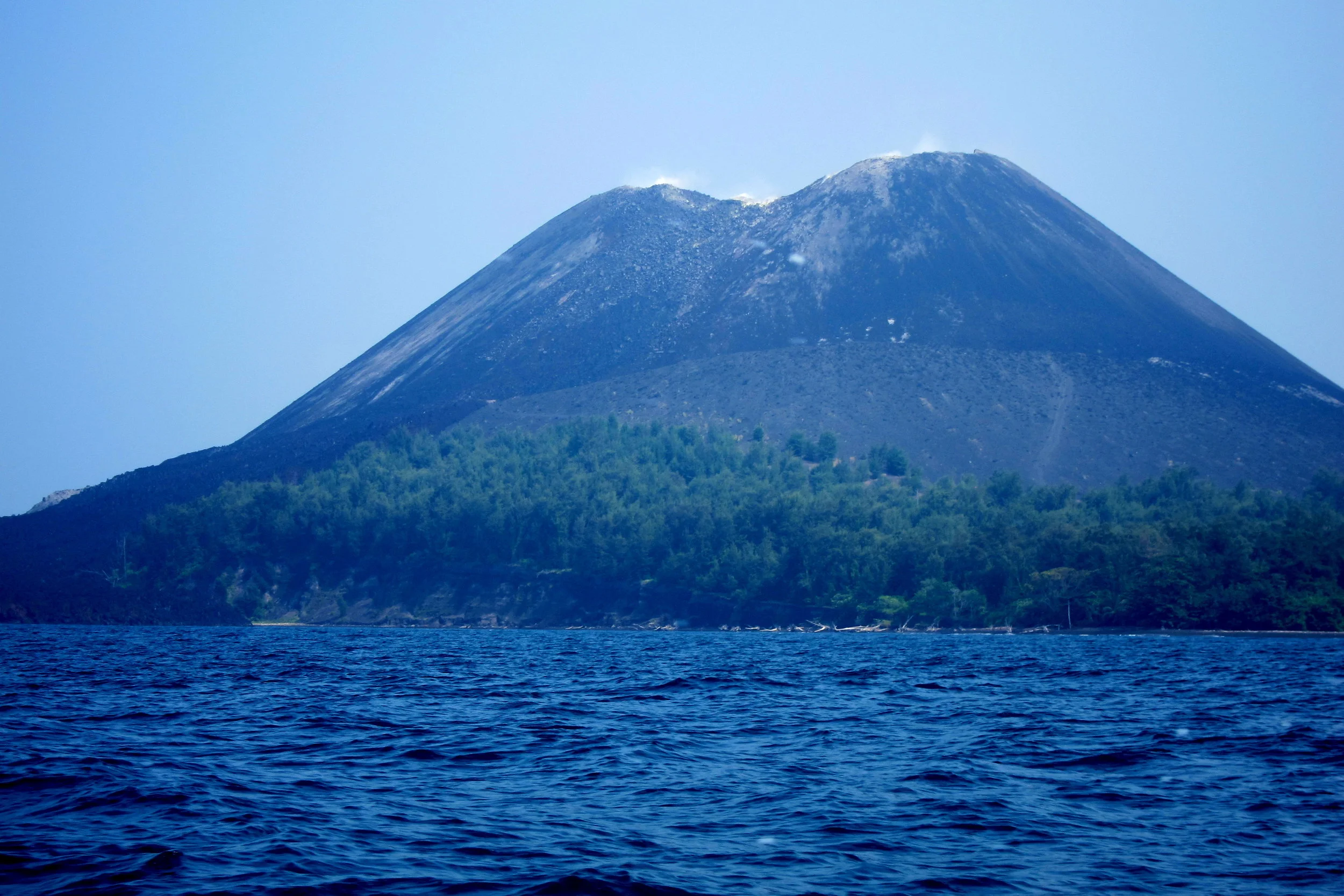  Anak Krakatau (the child of Krakatoa), which first penetrated from the ocean depths in 1927 and has been growing at 5 m/year ever since. One day, it to will erupt to produce another global cataclysm. 