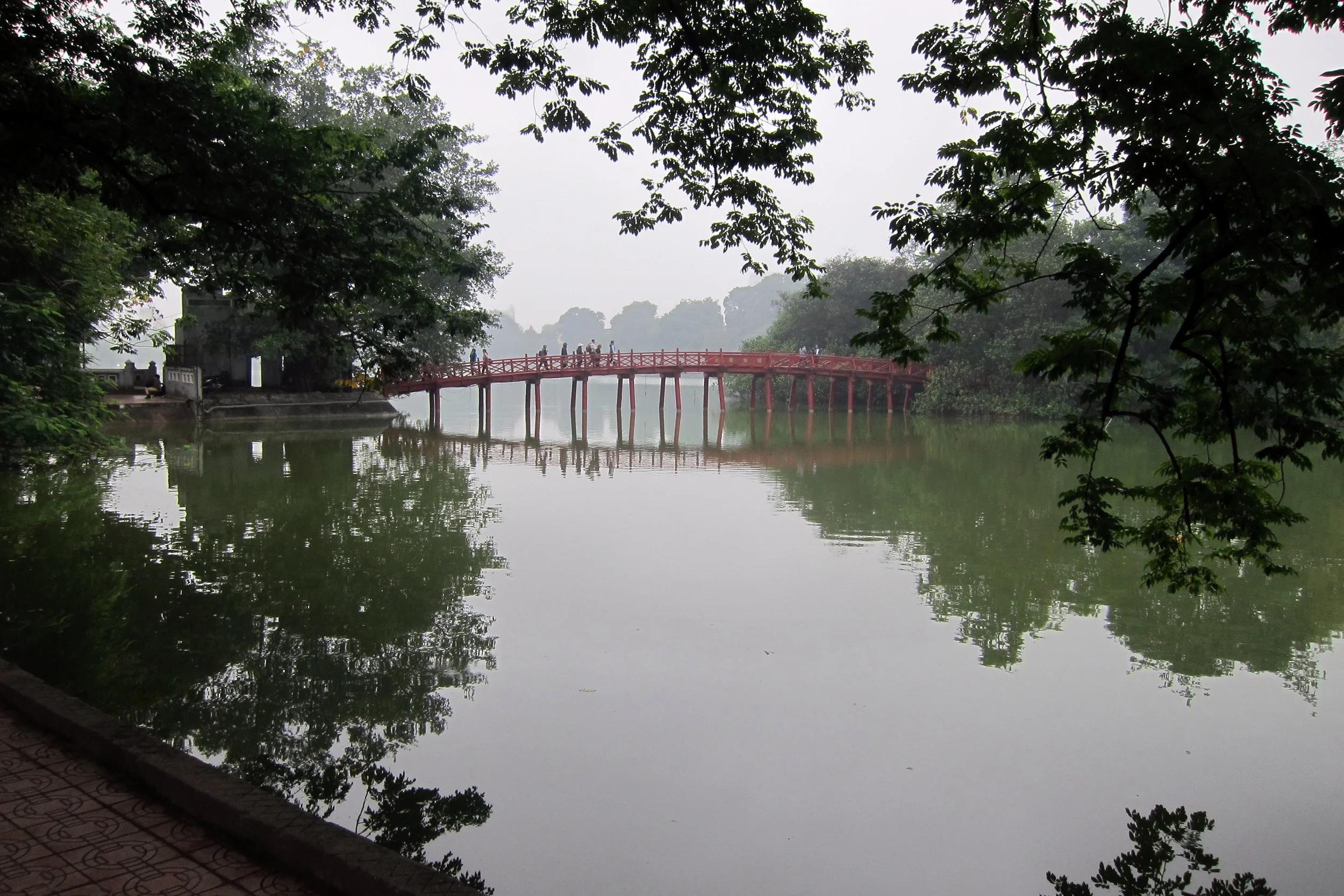  The bridge to the island temple on Hoàn Kiếm Lake, where legend holds that a tortoise rose from the lake with a sword on his back; and that sword was used to repel the Chinese army. 