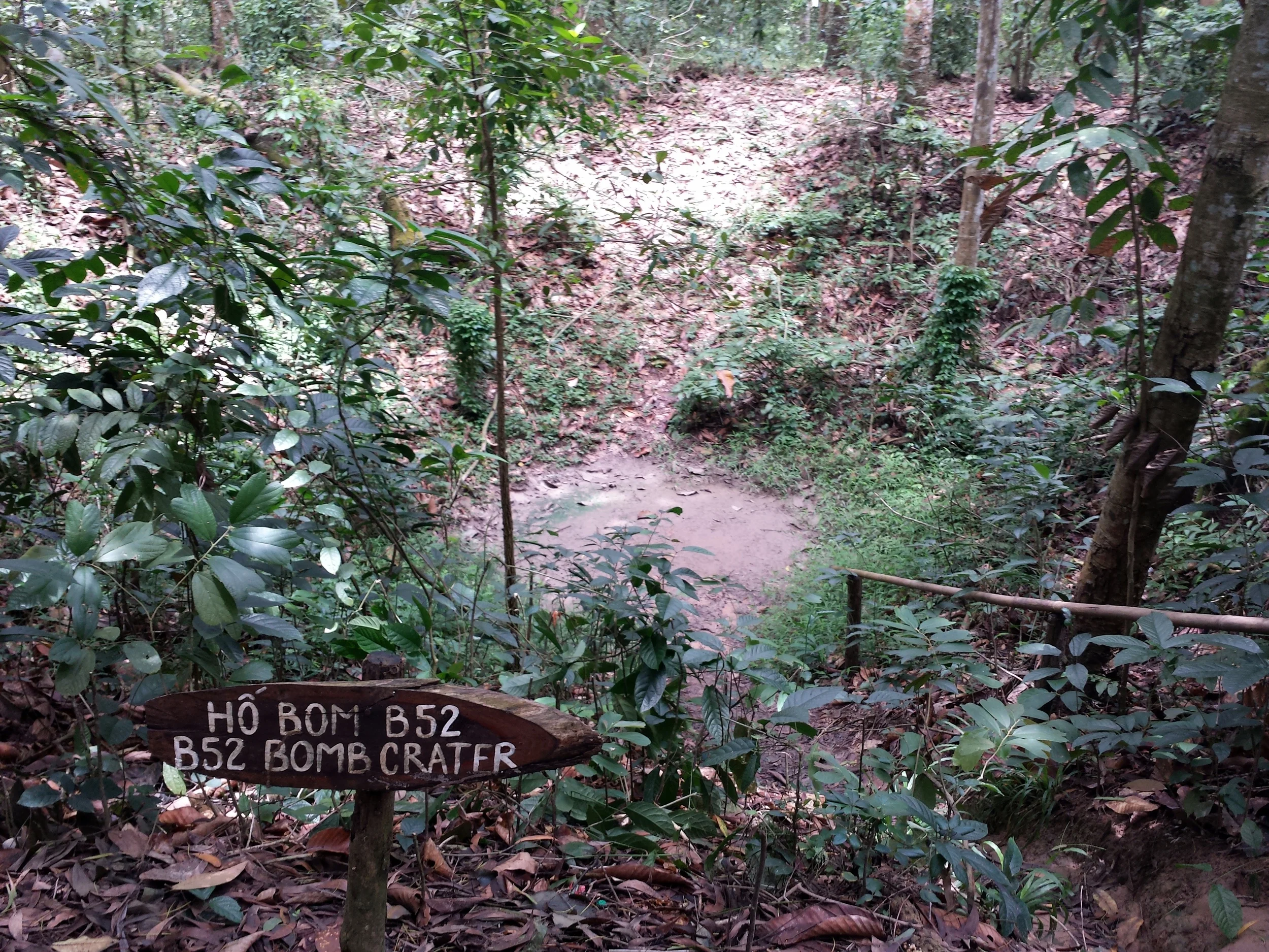 The landscape is littered with the massive craters from detonated B-52 bombs dropped by American aircraft trying to reach the tunnels.