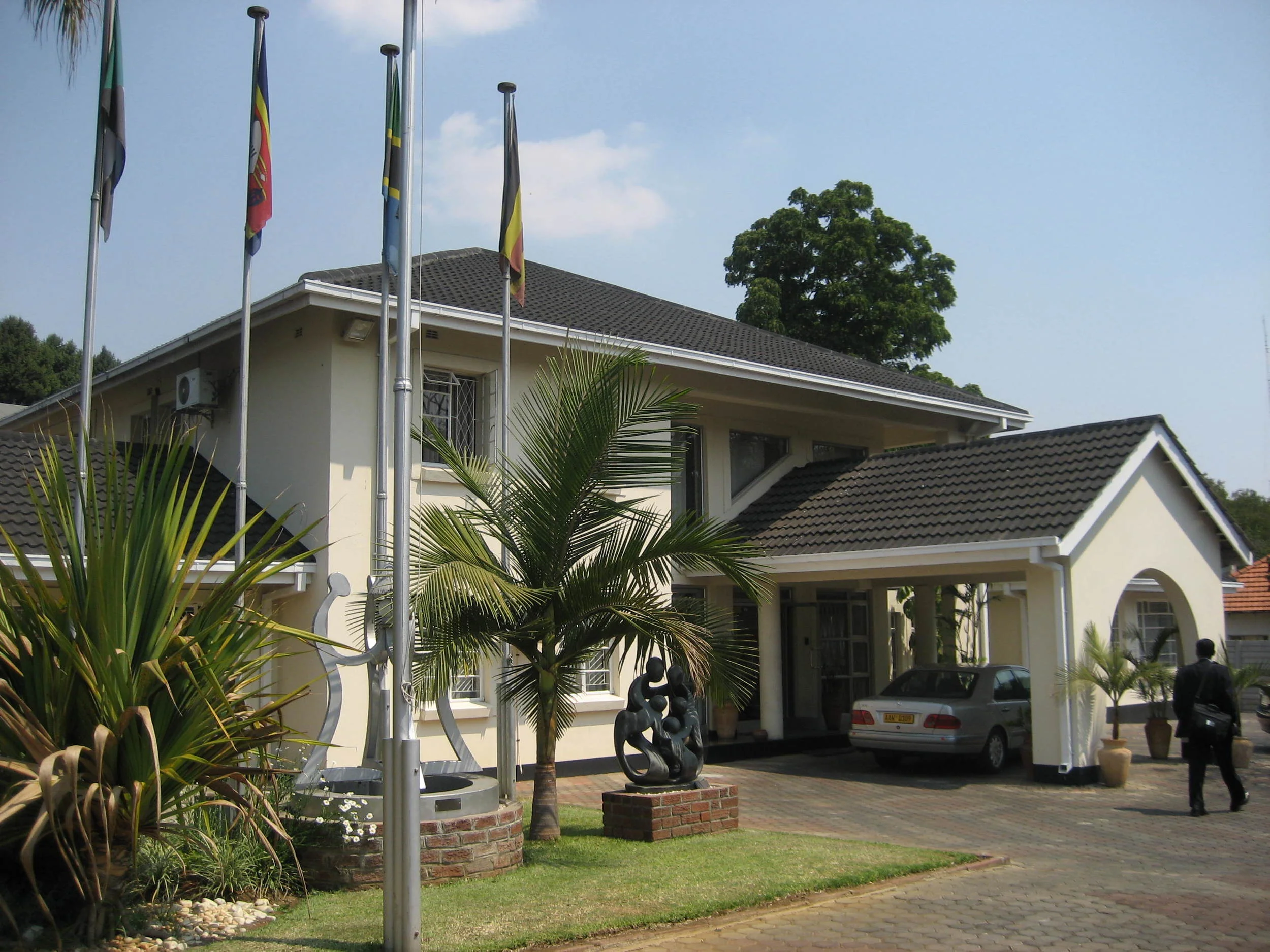  Outside the ARIPO building. The dark statue is the African unity symbol. 
