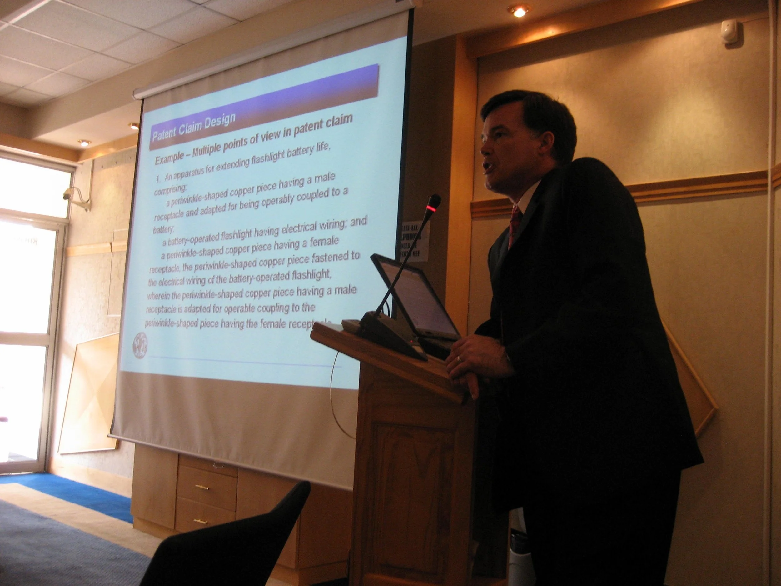  Tom, the author of most of the original program content, teaching patent claim design. 