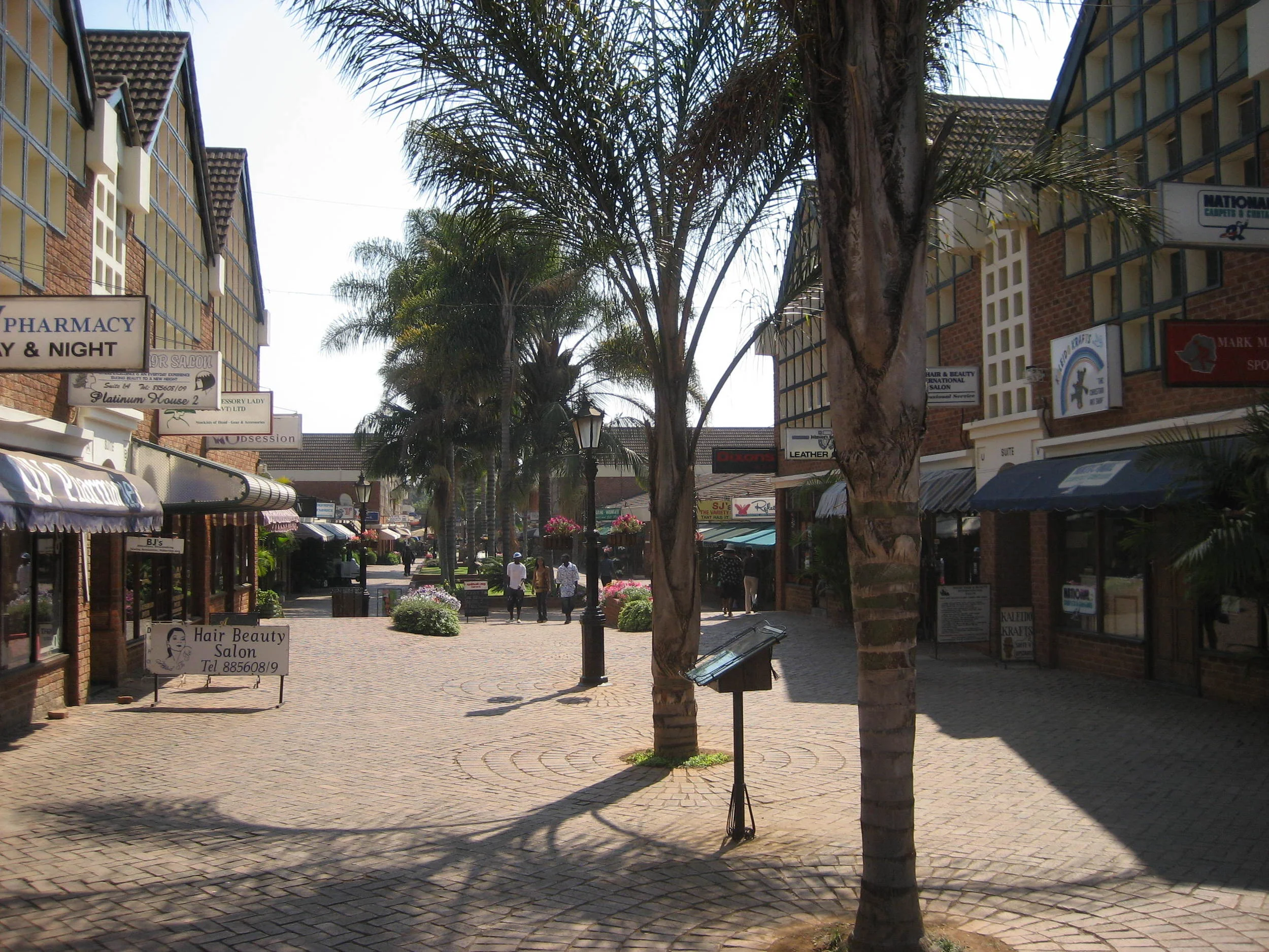  Borrowdale is a beautiful shopping area. Unfortunately, stores were recently subjected to a government-mandated 50% price reduction. The stores that refused (many) had their goods confiscated and auctioned off--leaving more empty stores.&nbsp;I have