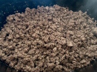 Browning the ground meat.