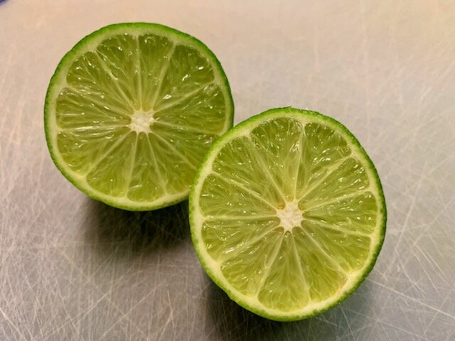 Preparing the lime to be juiced!