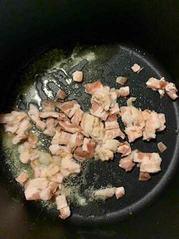 Cooking bacon with butter.