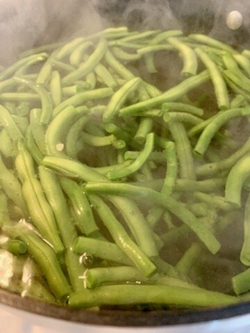 Blanching the beans.